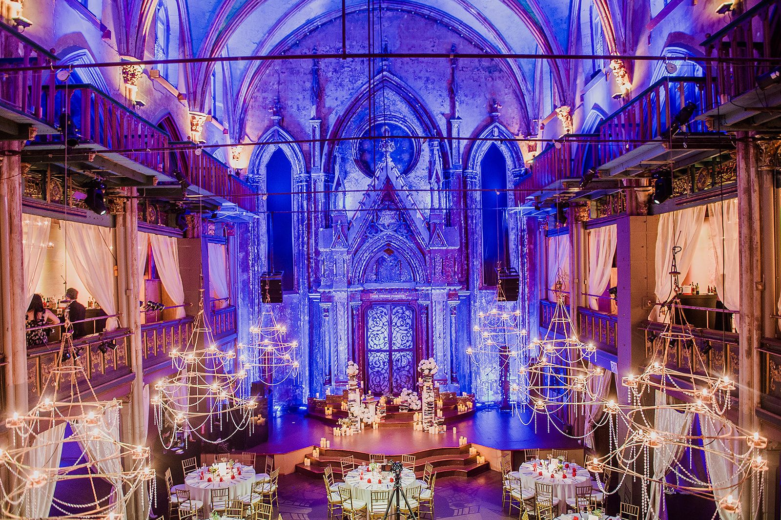 Chinese fusion wedding in a blue-lit historic nave, New York