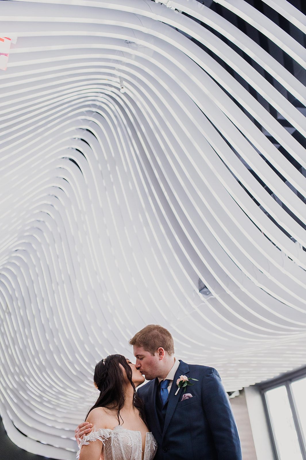 Beneath the sculpted ceiling