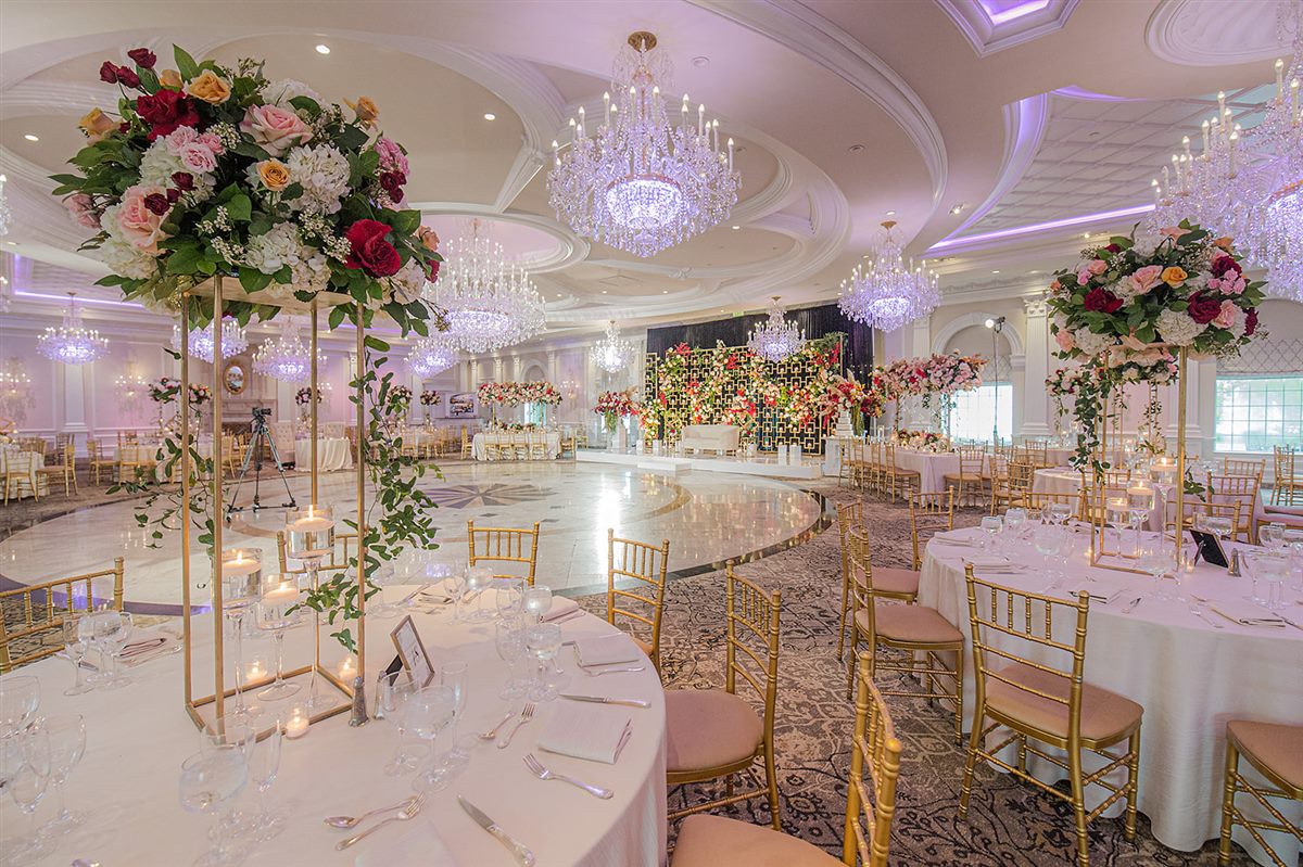 Roses on gold stands, the stage beyond