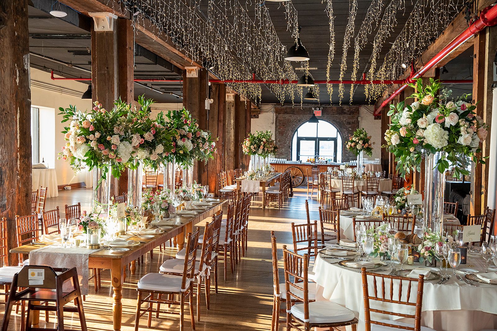 Long tables under the warehouse beams