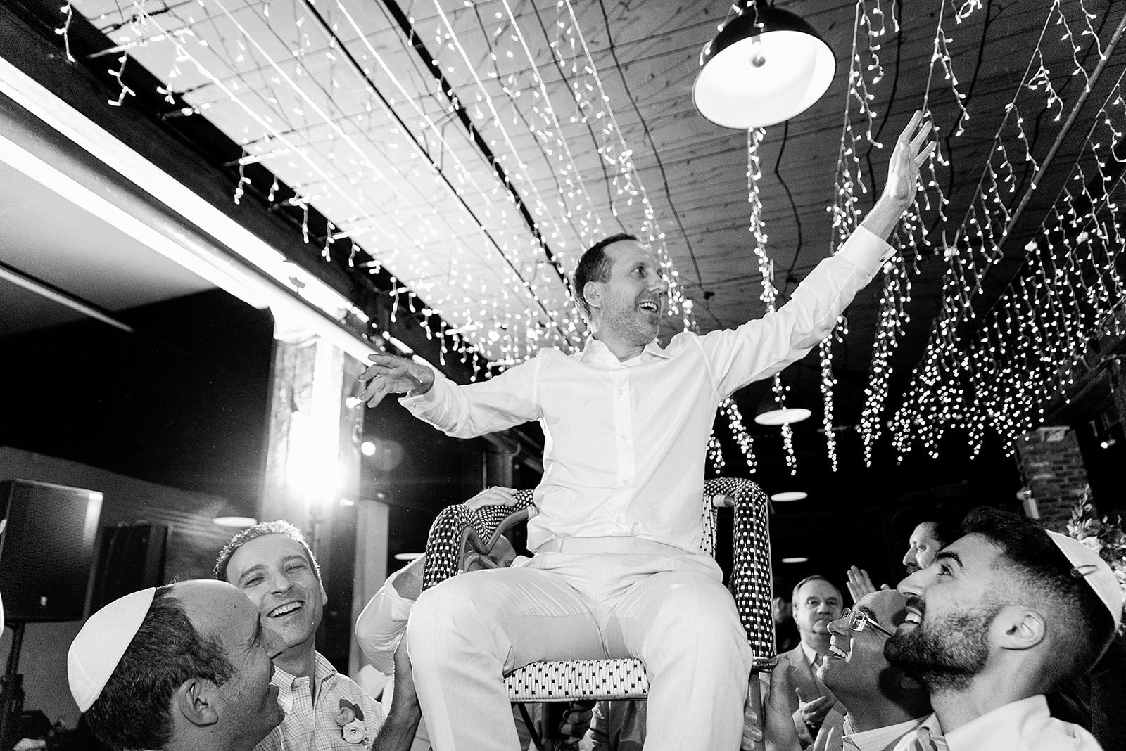 The hora, under a ceiling of lights