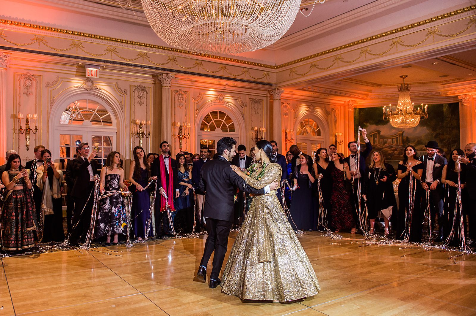 The first dance beneath the chandeliers