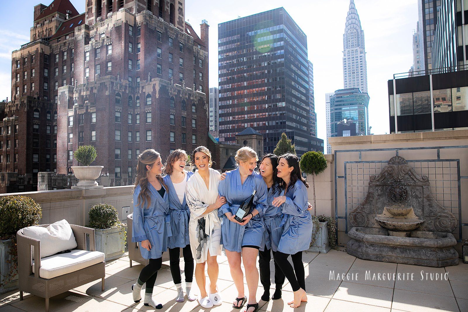 Natalie with her bridal party on the morning terrace beneath the Chrysler Building