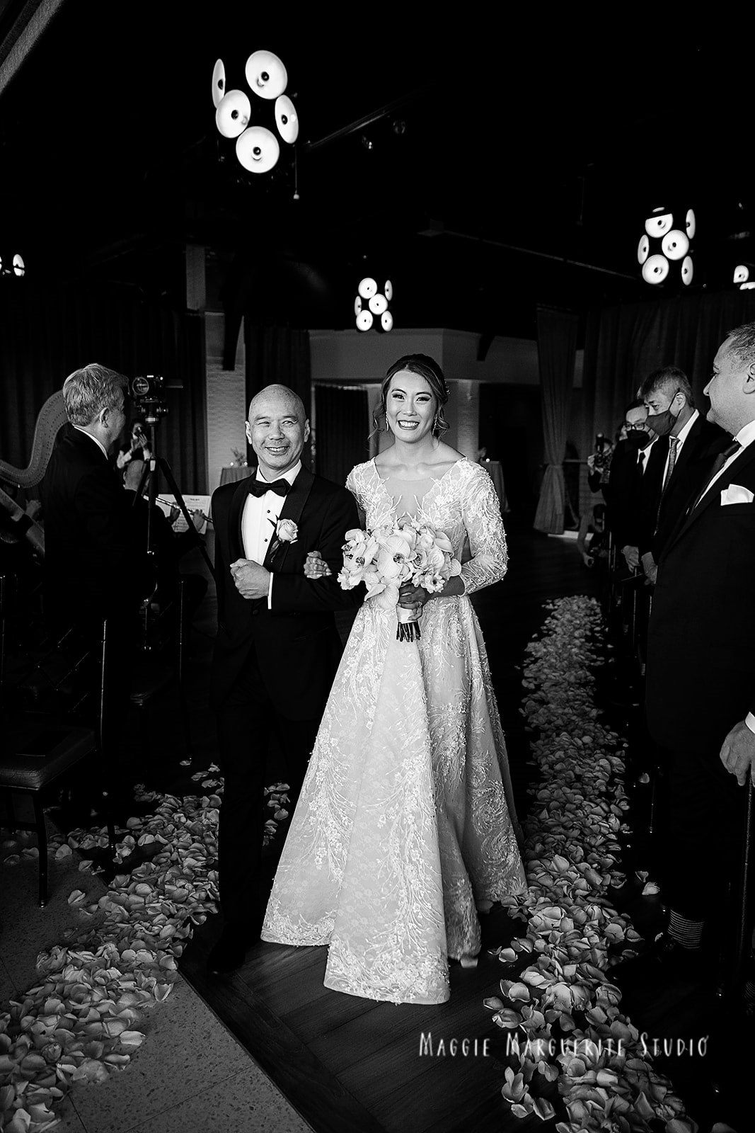 The bride, mid-aisle