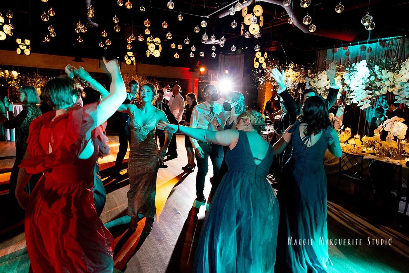 The dance floor, washed in teal